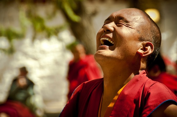 Monk laughing